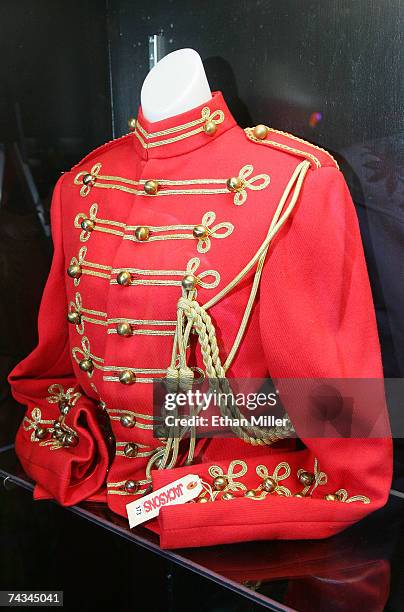 Michael Jackson's 1980s red coat with gold-toned embroidery and buttons designed by Bill Whitten is on display at The Joint music venue inside the...