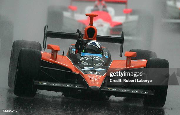 Dario Franchitti driver of the Canadian Club Andretti Green Racing Dallara Honda drives after winning the IRL Indycar Series 91st running of the...