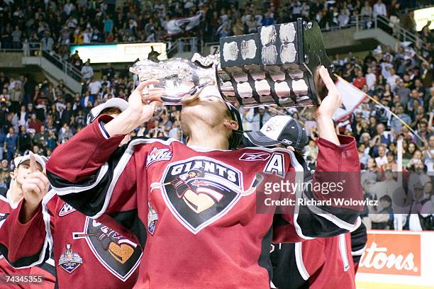 Milan Lucic, MVP of the 2007 Mastercard Memorial Cup, kisses the Memorial Cup trophy after the final game of the 2007 Mastercard Memorial Cup...