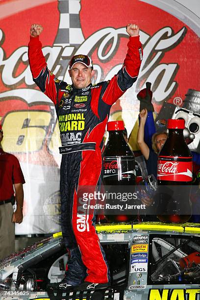 Casey Mears, driver of the National Guard Chevrolet, celebrates in victory lane after winning the NASCAR Nextel Cup Series Coca-Cola 600 on May 27,...