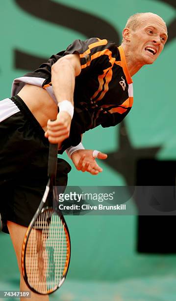 Nikolay Davydenko of Russia serves to Stefano Galvani of Italy during the Men's Singles 1st Round match on day two of the French Open at Roland...