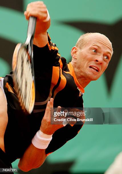 Nikolay Davydenko of Russia serves to Stefano Galvani of Italy during the Men's Singles 1st Round match on day two of the French Open at Roland...