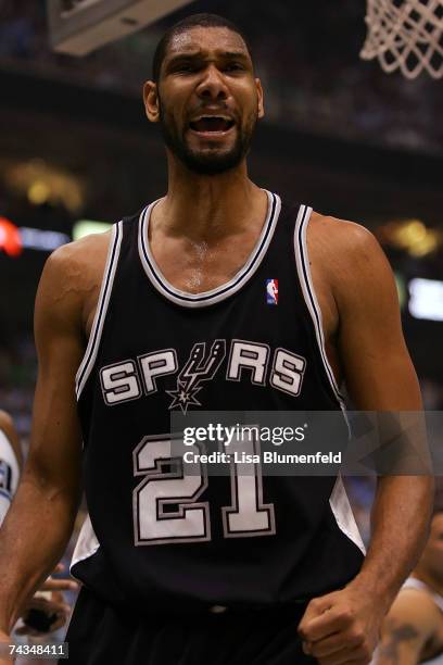 Tim Duncan of the San Antonio Spurs reacts in the first quarter against the Utah Jazz in Game Four of the Western Conference Finals during the 2007...