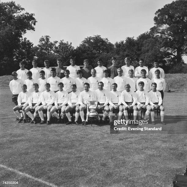 The Tottenham Hotspur squad posing with the FA Cup, 9th August 1967. Back row from left to right, Jimmy Pearce, Roger Hoy, Roy Henry, Roy Brown, Mike...