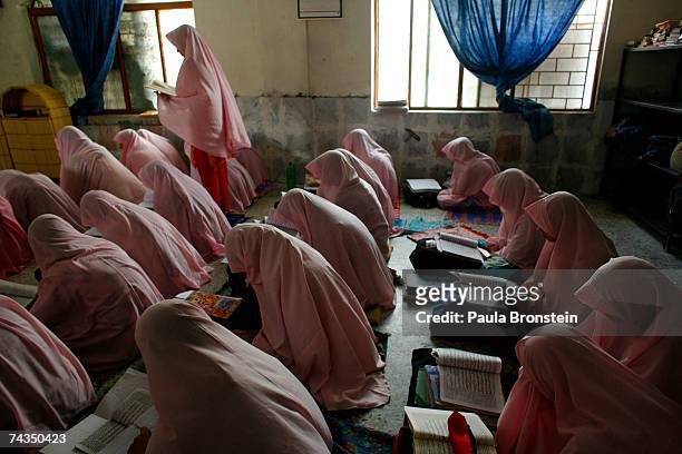 Students study at the Jamia Hafsa women's school or Madrassa inside the compound of the Lal mosque on May 28, 2007 in Islamabad, Pakistan. The Jamia...