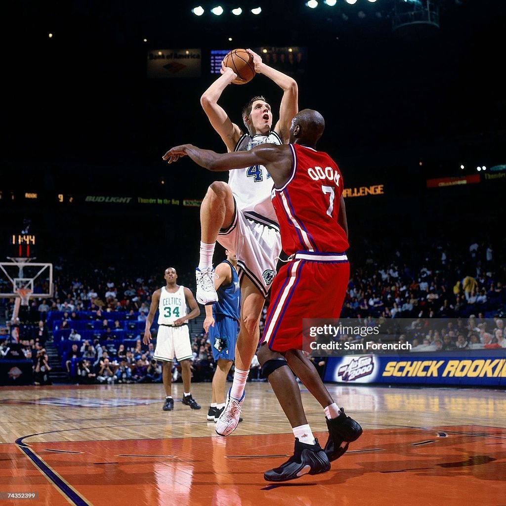 Dirk Nowitzki of the Sophmores attempts a shot against Lamar Odom of