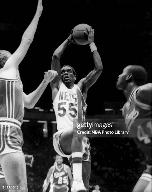 Albert King of the New Jersey Nets drives to the basket against the Sacramento Kings during a 1985 NBA game at Brendan Byrne Arena in East...