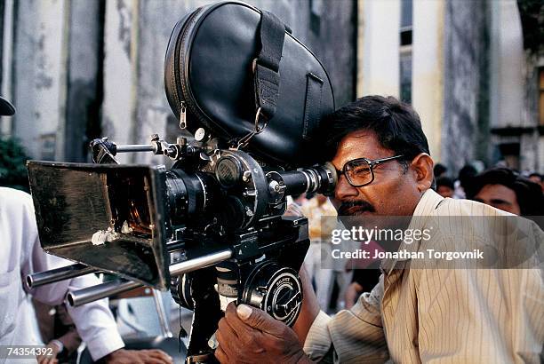 Camera operator on the set of a Bollywood film being shot at Film City January 1997 in Mumbai, India.