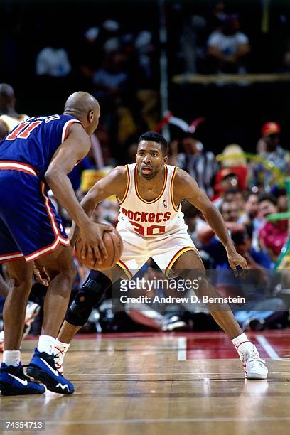 Kenny Smith of the Houston Rockets plays defense against Derek Harper of the New York Knicks during Game Six of the NBA Finals played on June 19,...