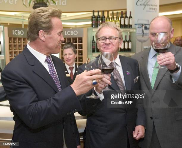 California Governor Arnold Schwarzenegger toasts with California wine at an LCBO store 29 May 2007 in Toronto, Ontario, Canada. The Governor is on a...