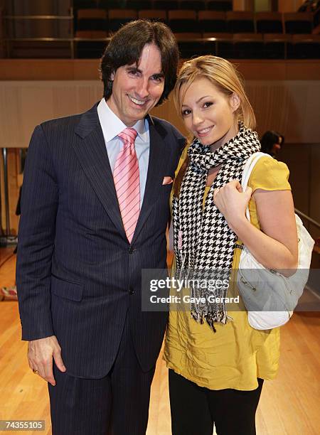 Dr John DeMartini poses with former Big Brother contestent Danielle Foote at "The Secret Revealed", an evening with Dr John Demartini based on the...