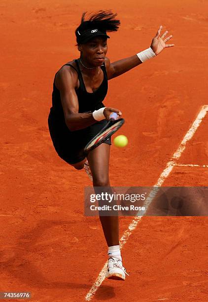 Venus Williams of United States of America returns a forehand to Ashley Harkleroad of United States of America during the Women's Singles 2nd round...