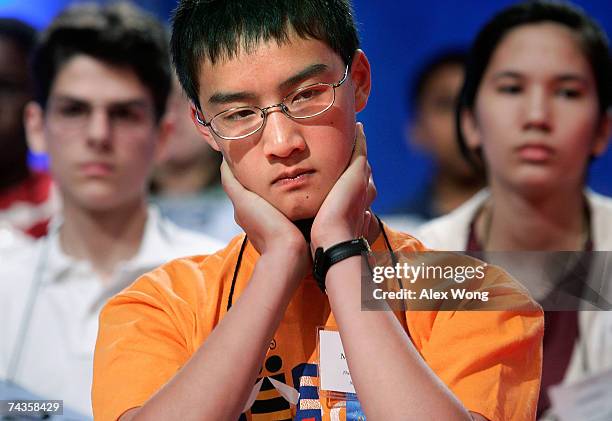Mervin Chen of Medina, Ohio, listens to other participants spell words during the 2007 Scripps National Spelling Bee May 30, 2007 in Washington, DC....