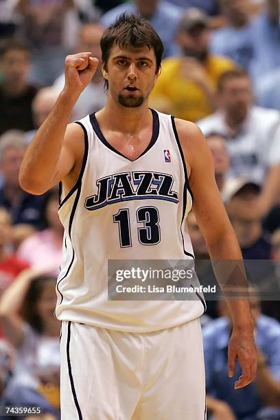 Mehmet Okur of the Utah Jazz reacts against the San Antonio Spurs during Game Four of the Western Conference Finals during the 2007 NBA Playoffs at...