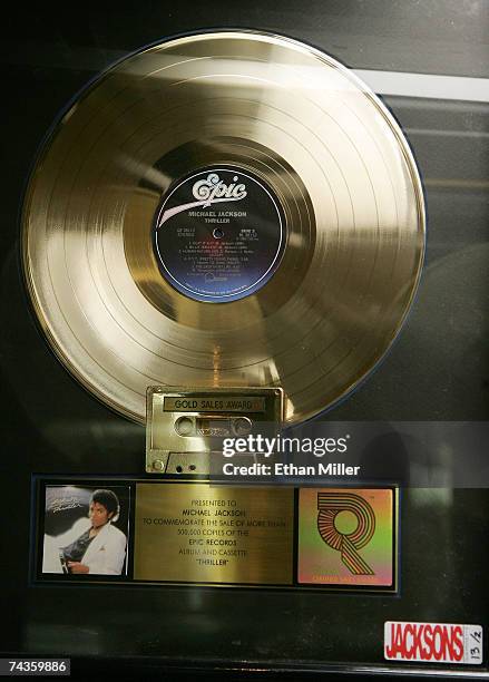 Michael Jackson's RIAA certified gold LP commemorating the sale of 500,000 copies of his album, "Thriller" is displayed during a preview for an...