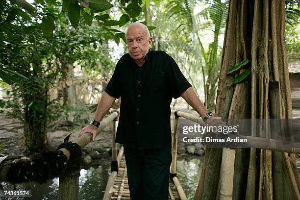 Australian businessman Warwick Purser, owner of the craft company 'Out of Asia' poses for a portrait in his home in Tembi village on May 31, 2007...