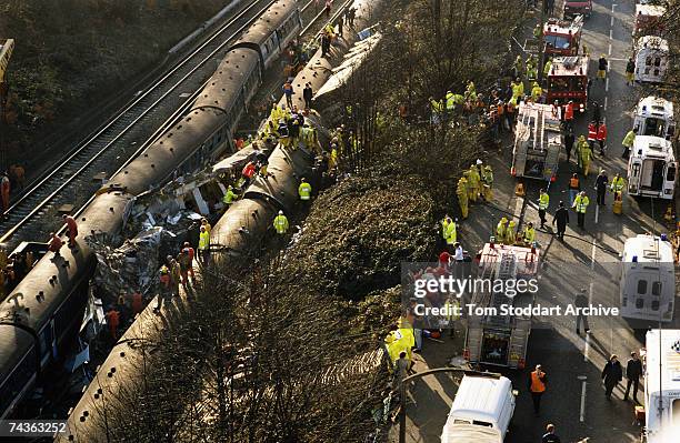 Tthe emergency services attend a rail crash near Clapham Junction in London, in which 35 people were killed and over 100 injured, December 1988.