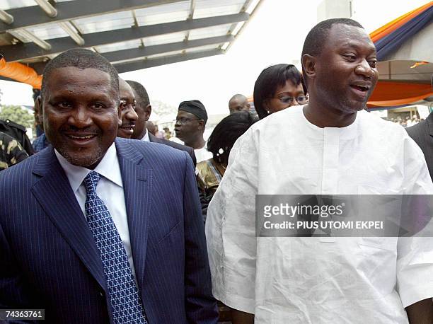 Nigerian businessmen Aliko Dangote and Femi Otedola arrive for the opening of the second Lagos domestic airport MM2 07 April 2007. AFP PHOTO / PIUS...