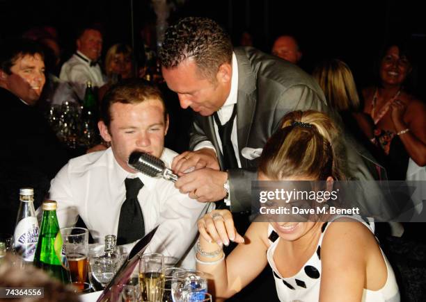 Football player Wayne Rooney and fiancee Coleen McLoughlin attend the Max Beesley And Ryan Giggs Golf Classic And Dinner at the Belfry Golf Club May...