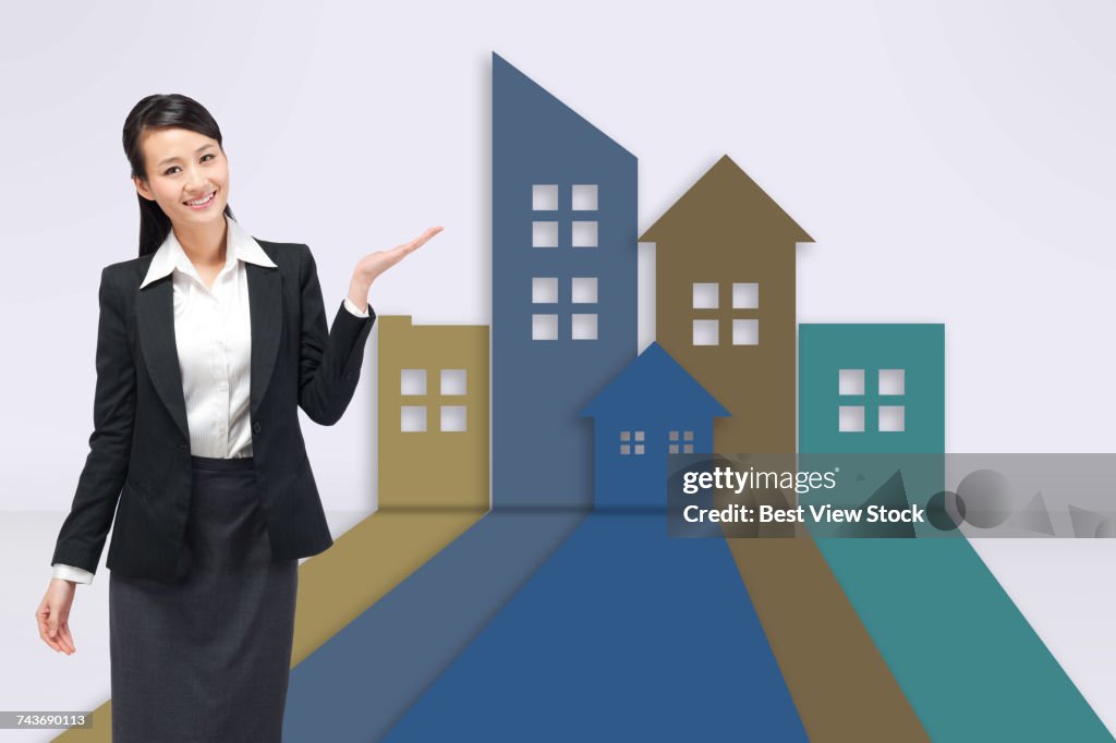 Young business woman and building