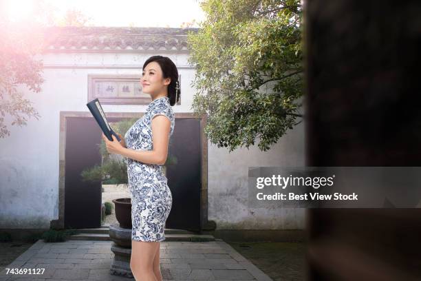 chinese cheongsam image - old book side stock pictures, royalty-free photos & images