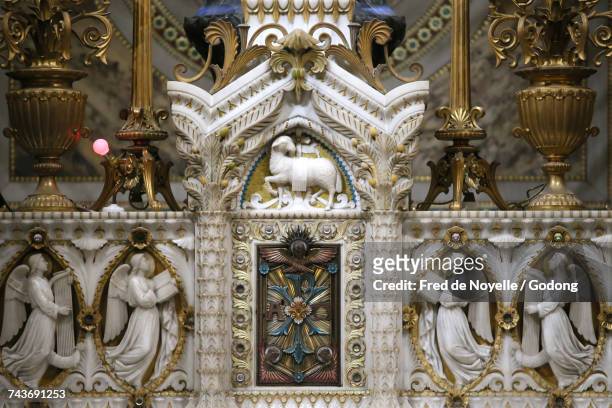 notre dame de fourviere basilica. main tabernacle and angels.  france. - lamb of god stock pictures, royalty-free photos & images