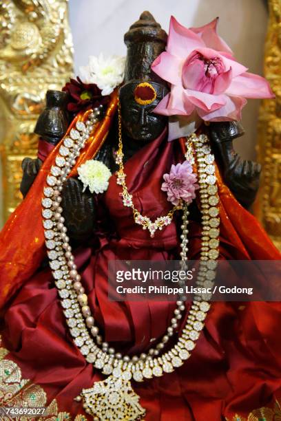 thaipusam (tamil new year) celebration at the paris ganesh temple. goddess laxmi. france. - laxmi ganesh stock-fotos und bilder
