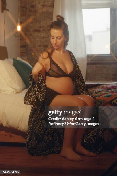 young pregnant woman in bedroom - 67percentcollection bildbanksfoton och bilder