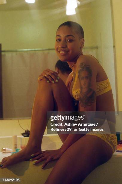 young woman in bathroom  - 67percentcollection stock pictures, royalty-free photos & images