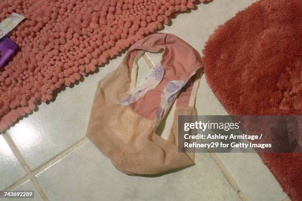 underwear with feminine product on floor - 67percentcollection stock pictures, royalty-free photos & images