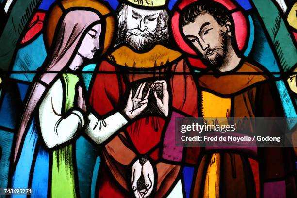 stained glass window in saint-joseph des fins basilica. mariage of joseph and mary. france. - mariage stock pictures, royalty-free photos & images