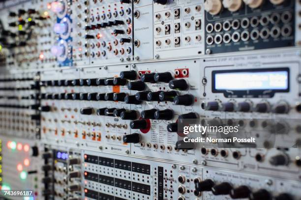 full frame shot of modular set up at recording studio - sintetizador fotografías e imágenes de stock