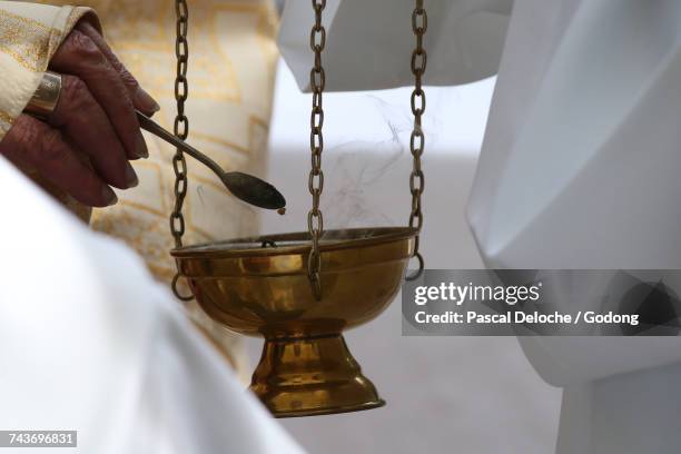 sanctuary of la benite fontaine. altar boy.  france. - censer stock pictures, royalty-free photos & images