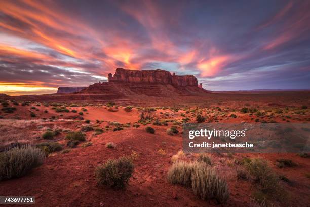 sunset over sentinel mesa, monument valley, arizona, america, usa - arizona stock-fotos und bilder