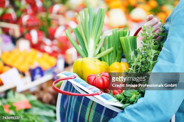 fresh vegetables in a checked shopping bag - origan stock pictures, royalty-free photos & images