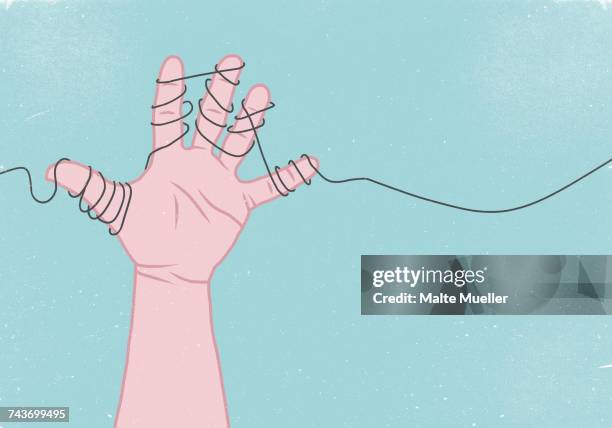 stockillustraties, clipart, cartoons en iconen met cropped image of hand wrapped in thread against blue background - vastmaken