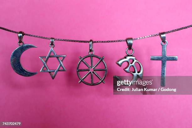 symbols of islam, judaism, buddhism, hinduism and christianity. france. - religious equipment fotografías e imágenes de stock