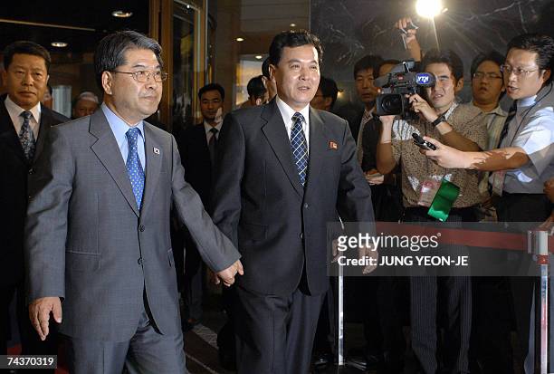 South Korean Unification Minister Lee Jae-Joung and his Northern counterpart Kwon Ho-Ung leave the hotel after four days of high-level talks in...
