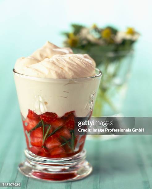 fontainebleau with strawberries and rosemary( topic :cream of fresh cheeses) - fromage blanc photos et images de collection