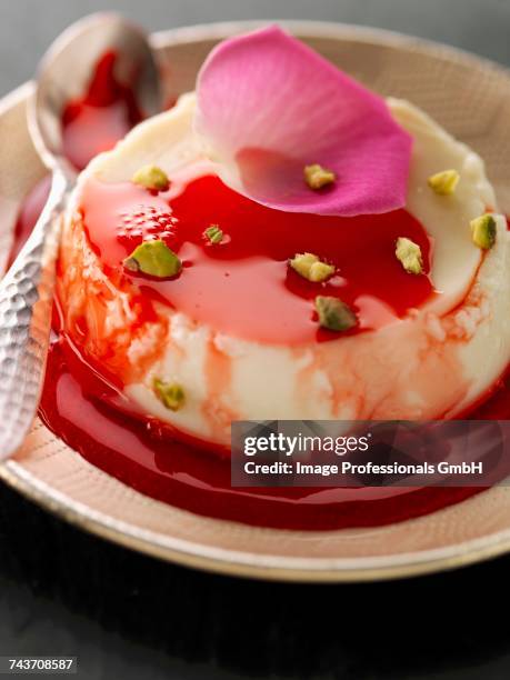 lebanese flan with summer fruit puree and pstachios - flan stock pictures, royalty-free photos & images