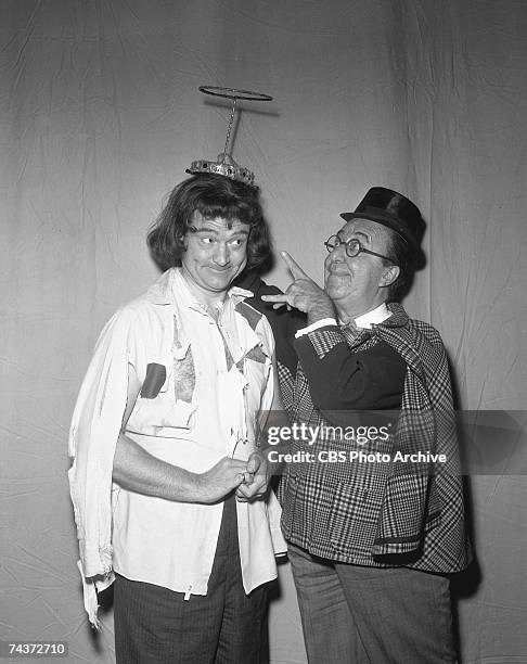 American comedian and entertainers Red Skelton and Ed Wynn clown around an episode of 'The Red Skelton Show,' October 17, 1955.