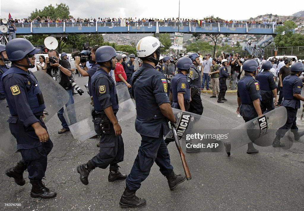 Riot police patrols the streets of Carac...