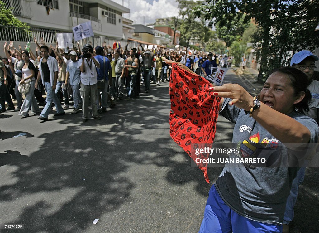 A supporters of Venezuelan President Hug...