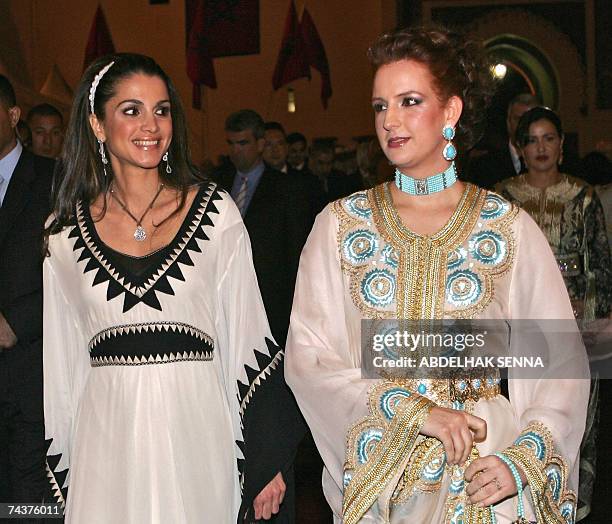 Queen Rania of Jordan and Morocco's King Mohammed VI's wife Lalla Salma smile as they arrive 01 June 2007 to the Sacred Musics Festival in Fez. AFP...