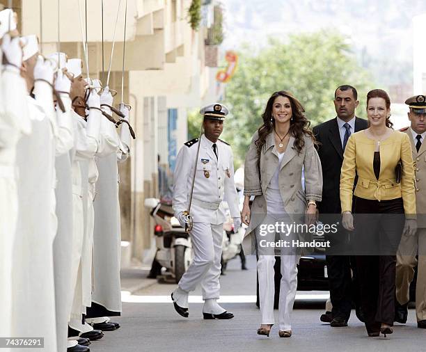 In this handout photo provided by the Jordanian Royal Court, Queen Rania of Jordan and Princess Lalla Salma of Morocco, the wife of Morocco's King...