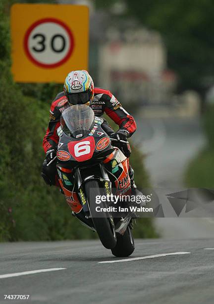 Ian Hutchinson exits Kirk Michael during practice of the Isle of Man TT Races June 1, 2007 in Kirk Michael, in Isle of Man, United Kingdom.