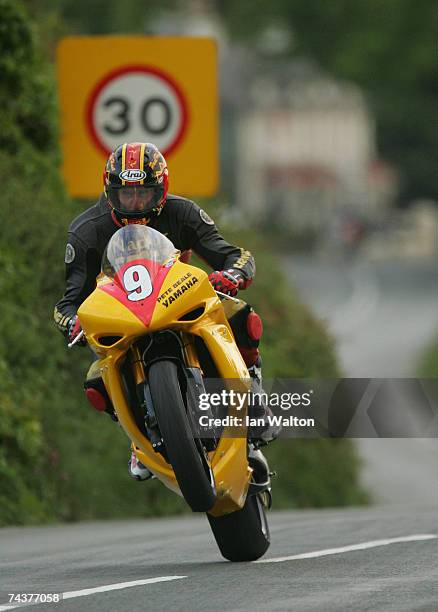 Ryan Farquhar exits Kirk Michael during practice of the Isle of Man TT Races June 1, 2007 in Kirk Michael, in Isle of Man, United Kingdom.