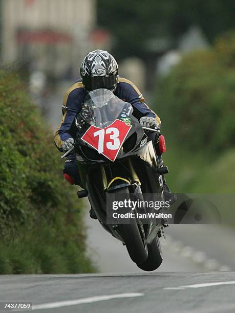 Bob Collins exits Kirk Michael during practice of the Isle of Man TT Races June 1, 2007 in Kirk Michael, in Isle of Man, United Kingdom.