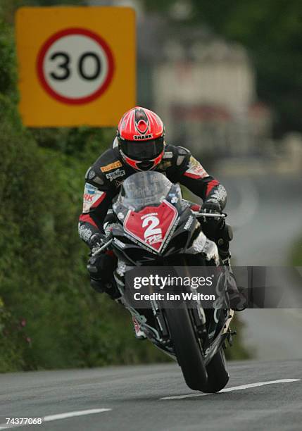 Adrian Archibald exits Kirk Michael during practice of the Isle of Man TT Races June 1, 2007 in Kirk Michael, in Isle of Man, United Kingdom.