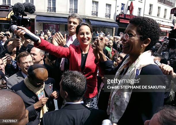 French former socialist presidential candidate Segolene Royal gestures to supporters during a support visit to Socialist party's candidates for the...